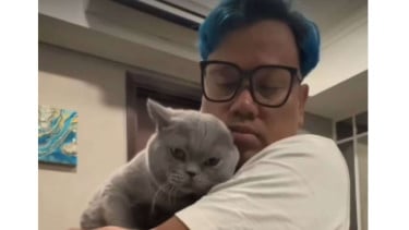 Ua kua y su gato mascota