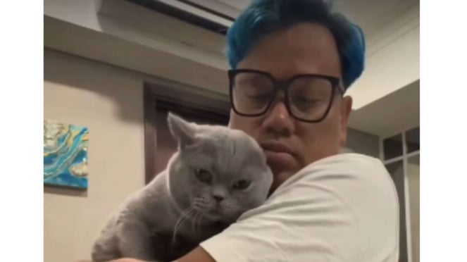 Ua kua y su gato mascota